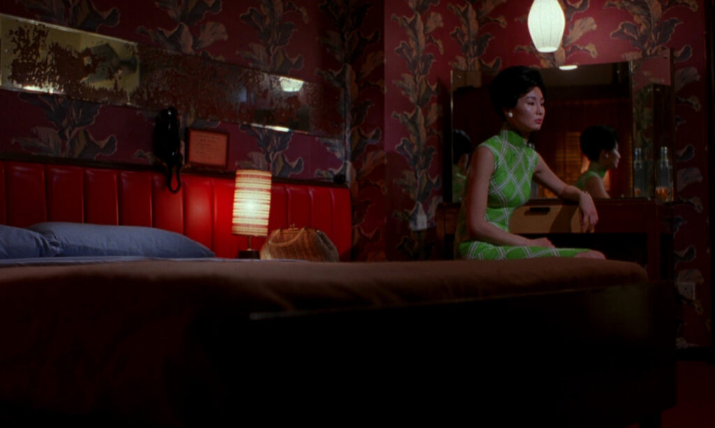 An elegant interior from In the Mood for Love (2000) showcases Wong Kar-wai's iconic use of color and composition.