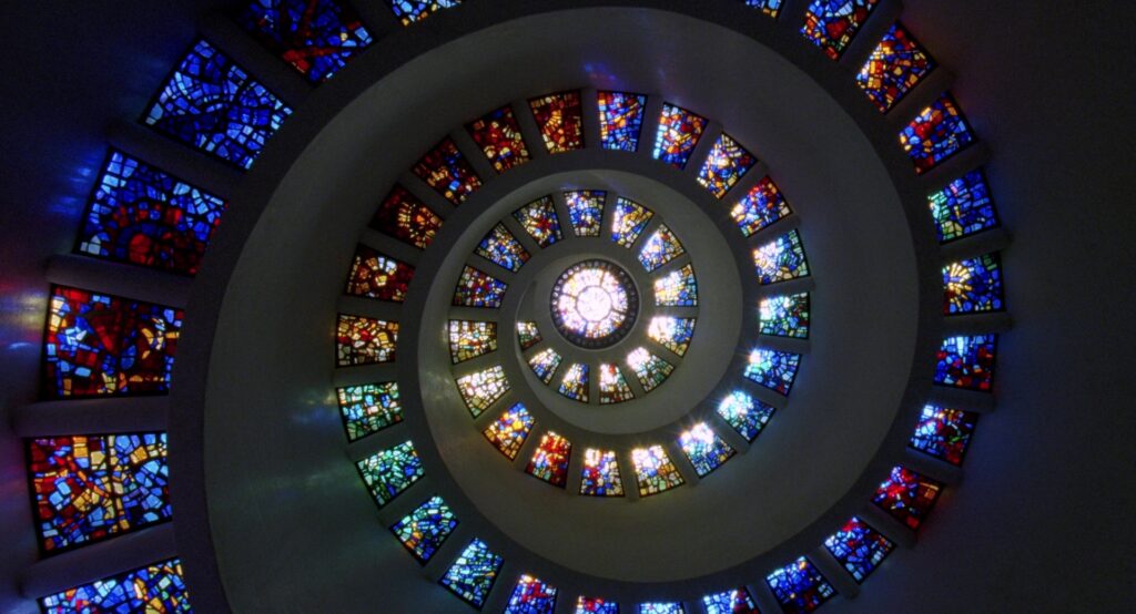 A spiral stained-glass ceiling in The Tree of Life (2011), reflecting the film's spiritual themes.