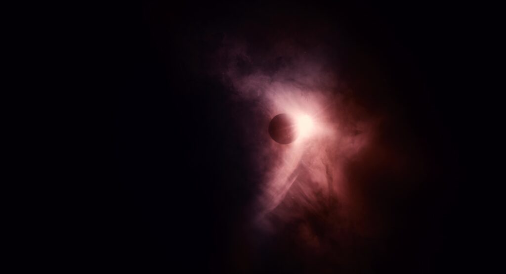 A cosmic eclipse sequence in The Tree of Life (2011) explores creation and the universe.