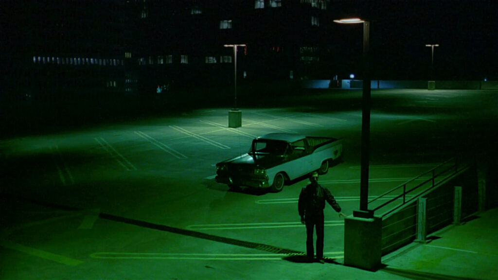 The empty urban landscape in Paris, Texas (1984) reflects themes of isolation and longing.