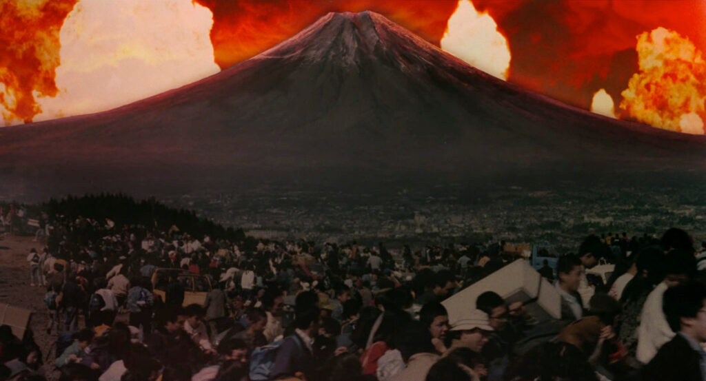 Crowds flee beneath an erupting Mount Fuji in Dreams (1990).