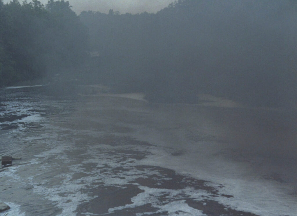 Foggy river landscape capturing the meditative pacing of Stalker (1979)