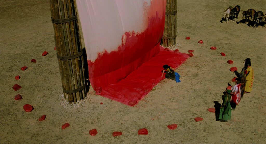 The Fall (2006) — a striking red-and-white tent set piece showcasing the film's bold color symbolism