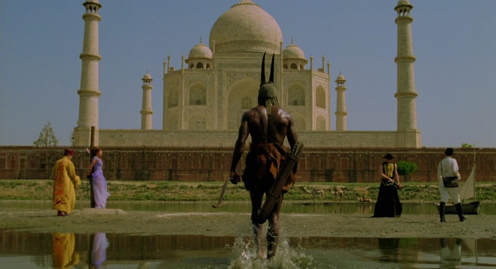 The Fall (2006) still — a masked fantasy warrior walking toward the Taj Mahal, one of the film's most iconic shots