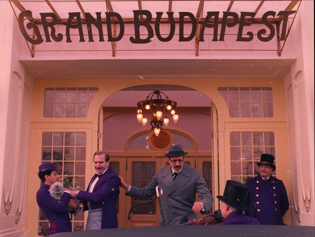 The Grand Budapest Hotel (2014) M. Gustave greeting guests at the hotel entrance