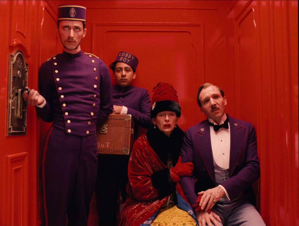 The Grand Budapest Hotel (2014) M. Gustave and Zero Moustafa with Madame D. in the hotel elevator