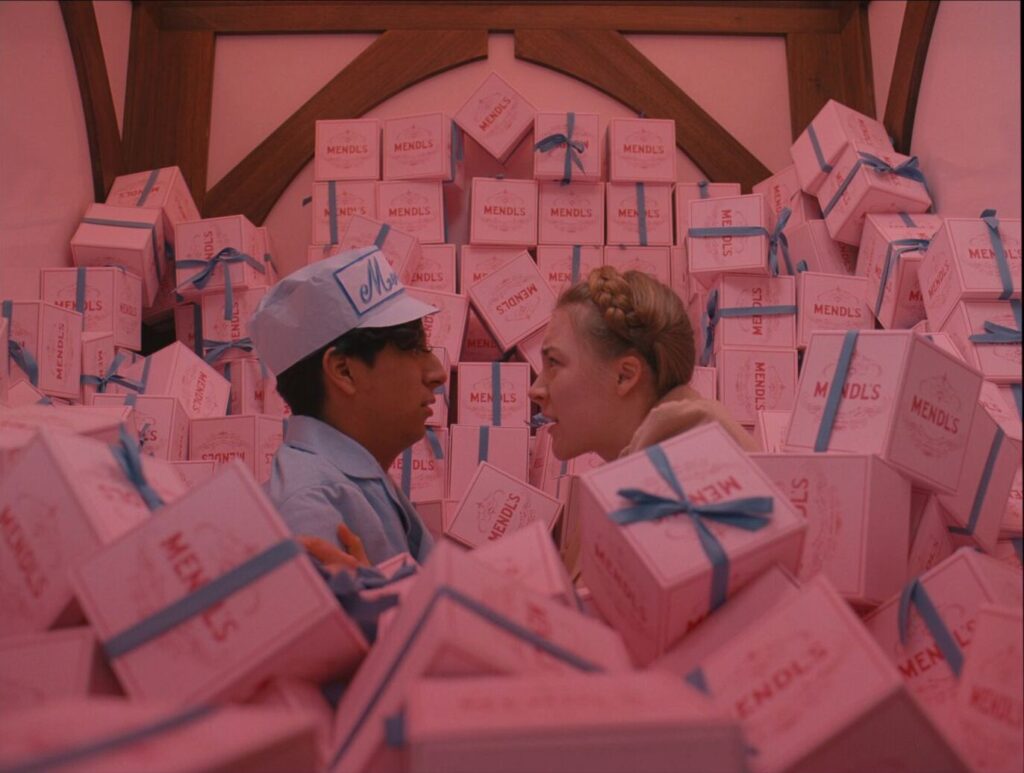 The Grand Budapest Hotel (2014) Zero and Agatha surrounded by pink Mendl's bakery boxes